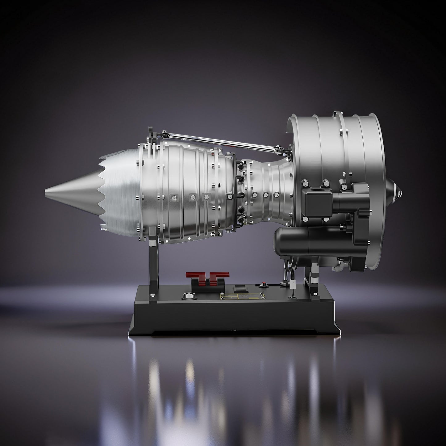 The Curious Mind medium turbofan engine DIY model kit, silver metal construction with black base and red accents.