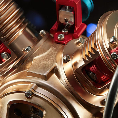 The Curious Mind Mini V2 Double-Cylinder Engine DIY Kit, a detailed metal mechanical model with copper and red accents.