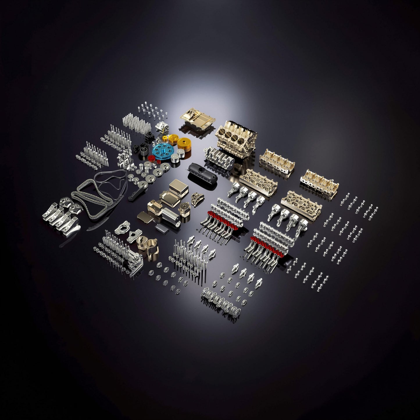 The Curious Mind V8 Car Engine DIY Kit, a premium metal mechanical model with many small parts, pistons, and engine blocks.