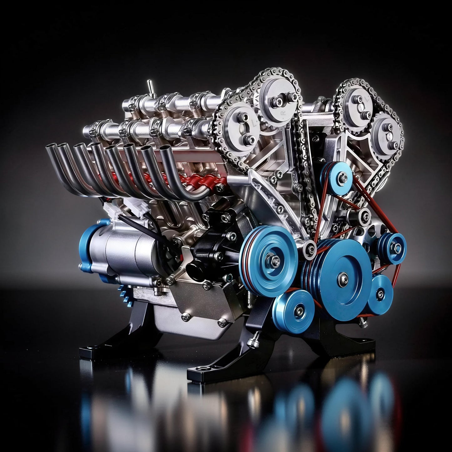 The Curious Mind V8 Car Engine DIY Kit, a detailed metal mechanical model with blue accents and visible chains and belts.