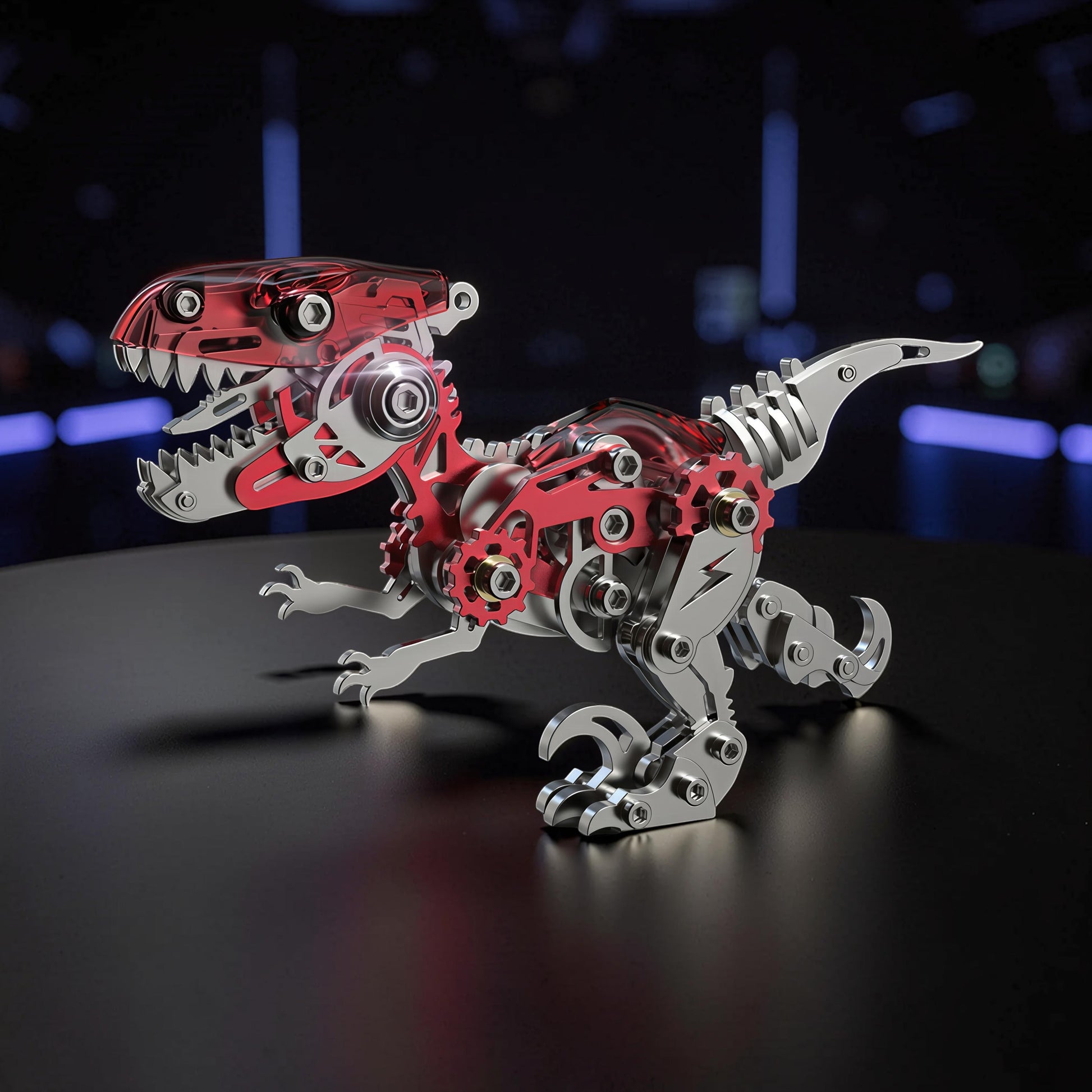 The Curious Mind Velociraptor 3D metal model kit with red transparent casing and silver mechanical parts.