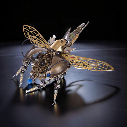 The Curious Mind War Beetle light-up 3D metal model kit, a steampunk-inspired mechanical insect with intricate gears, brass and silver metallic finishes, and delicate filigree wings.