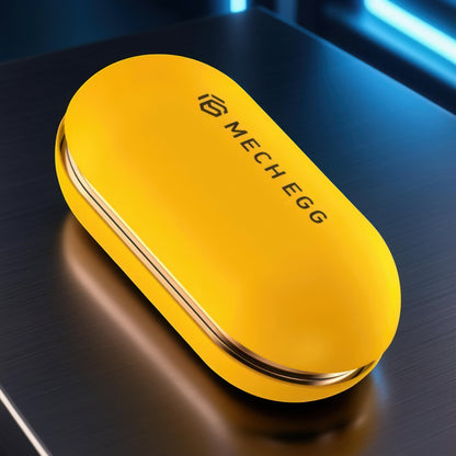 The Curious Mind yellow metal Mech Egg clicker slider fidget toy with a capsule shape and gold trim.