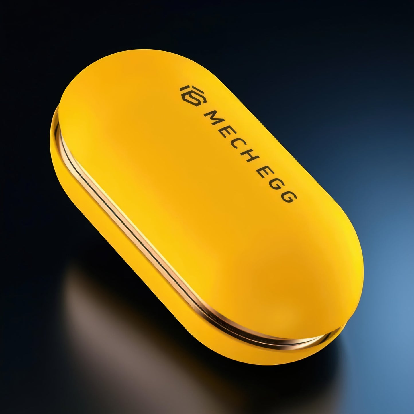 The Curious Mind Mech Egg Clicker Slider, a compact yellow metal fidget toy with a smooth, rounded capsule shape and a clicky slider action.